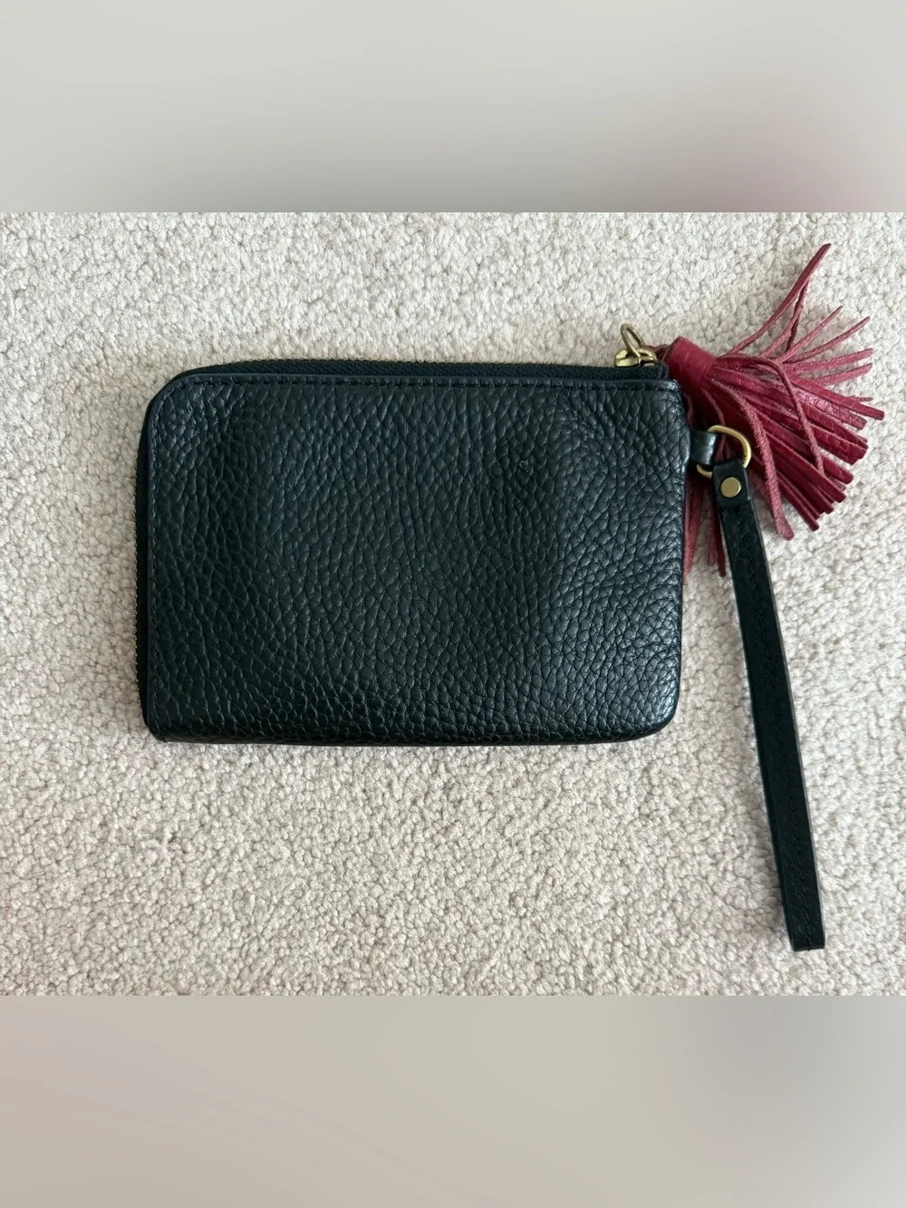 Fossil Black Pebbled Leather Wristlet with Red Tassel Accent